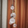 Suspension  cinq lampes avec grandes et petites boules en verre taill Check mini, Check small et Swirl